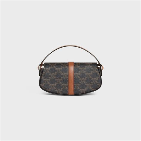 celine medium tabou|CLUTCH ON STRAP TABOU IN TRIOMPHE CANVAS AND .